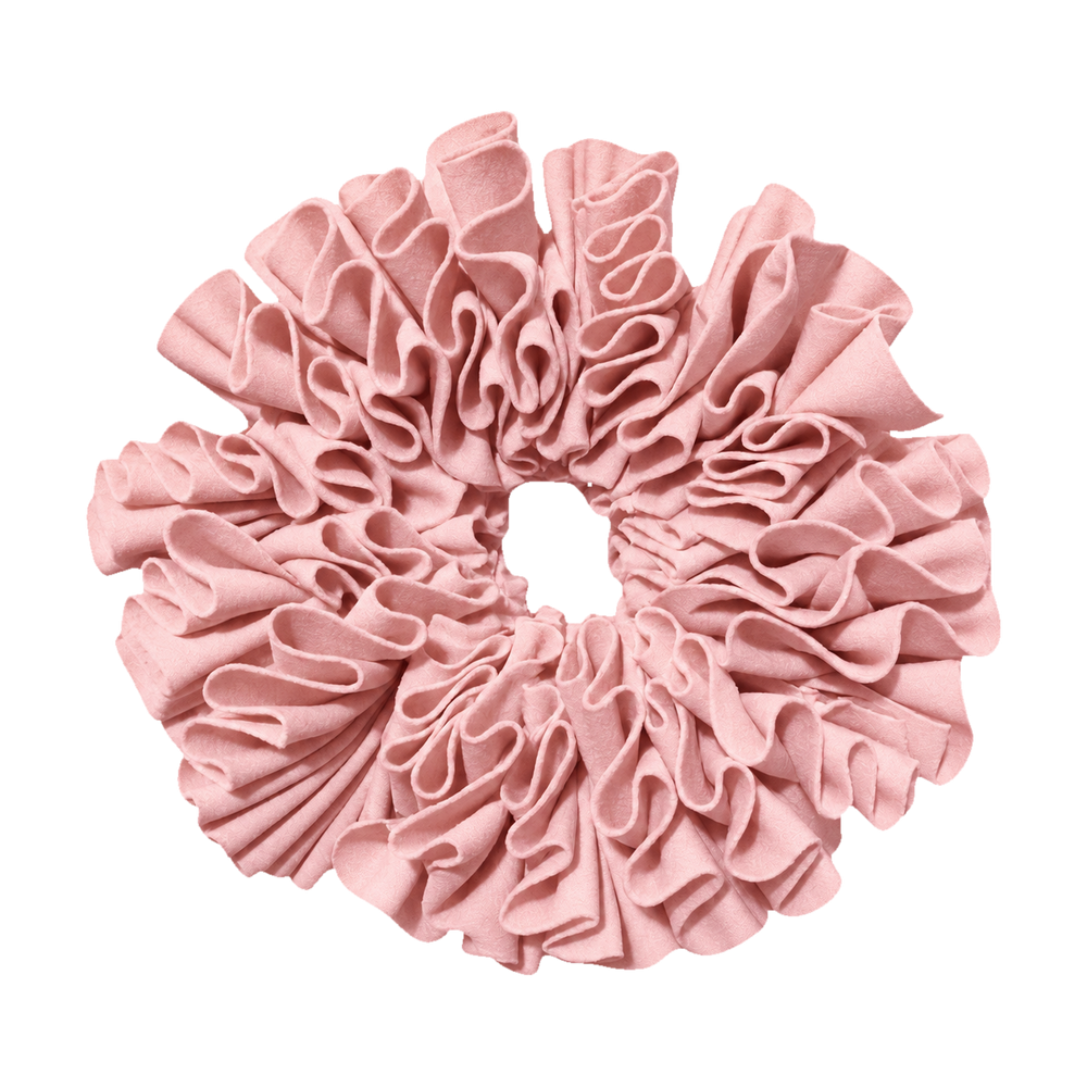 Moña dona en color rosado. Imagen de referencia del color.