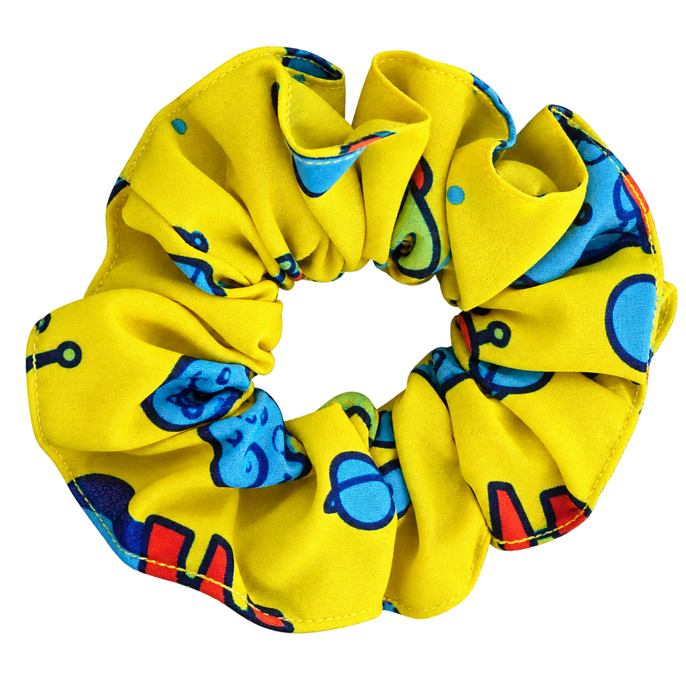 Scrunchie amarillo con dibujos